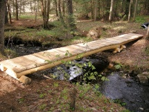 Small hemlock backcountry style bridge