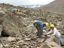 Building trail in a boulder field.