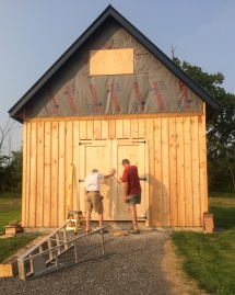 Hanging doors on a timber frame workshop Hanging doors on a timber frame workshop